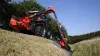 Obstacle clearance of the KUHN AGRI-LONGER GII Hedge and Grass Cutter with pivot-mounted arm safety