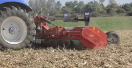 RM 610 shredder at work in corn residues