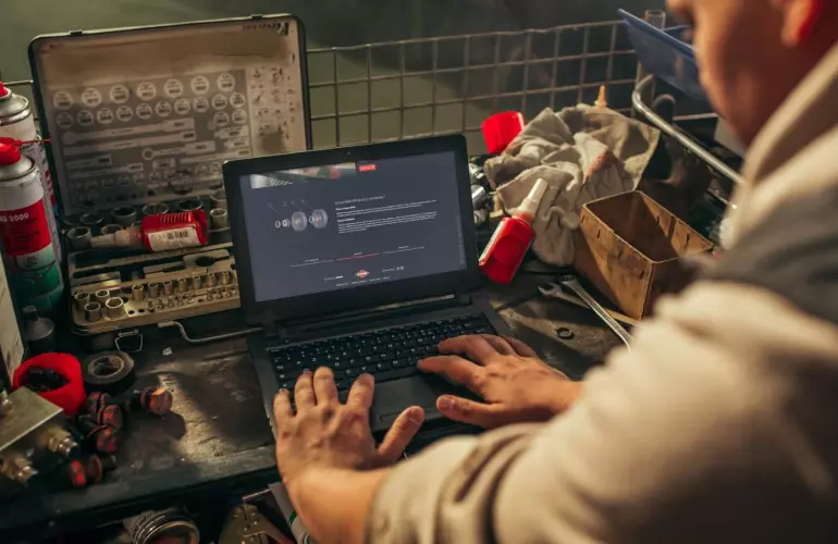 A farmer looking for a user manual in MyKUHN