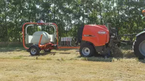 Coupling of baler and wrappers