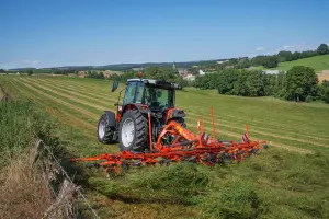 KUHN tedders GF 8703 at work in the field