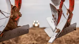 The ploughshare in steel working in field