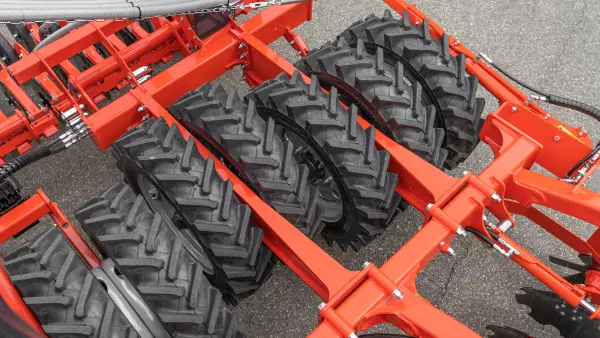 Offset tamping wheels for fuel savings