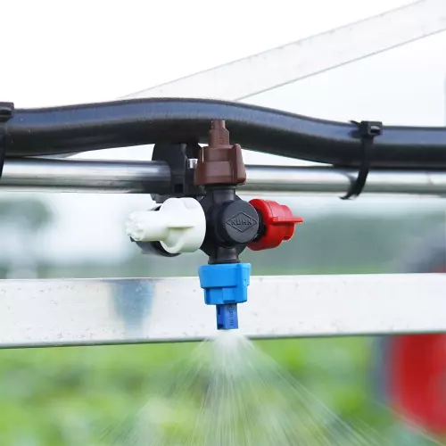 Photo of a Kuhn quadrijet in action