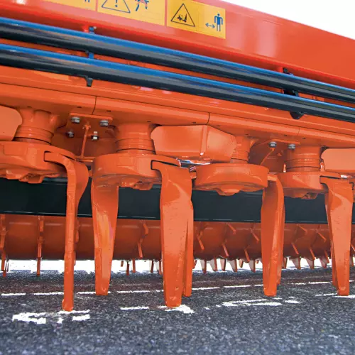 V-shaped stone guards for work in stony conditions