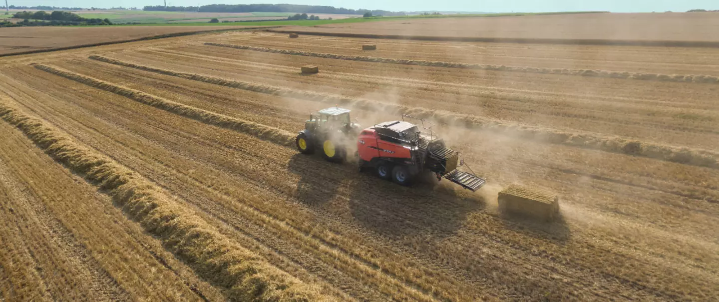 SB 1290 iD baling in a straw field