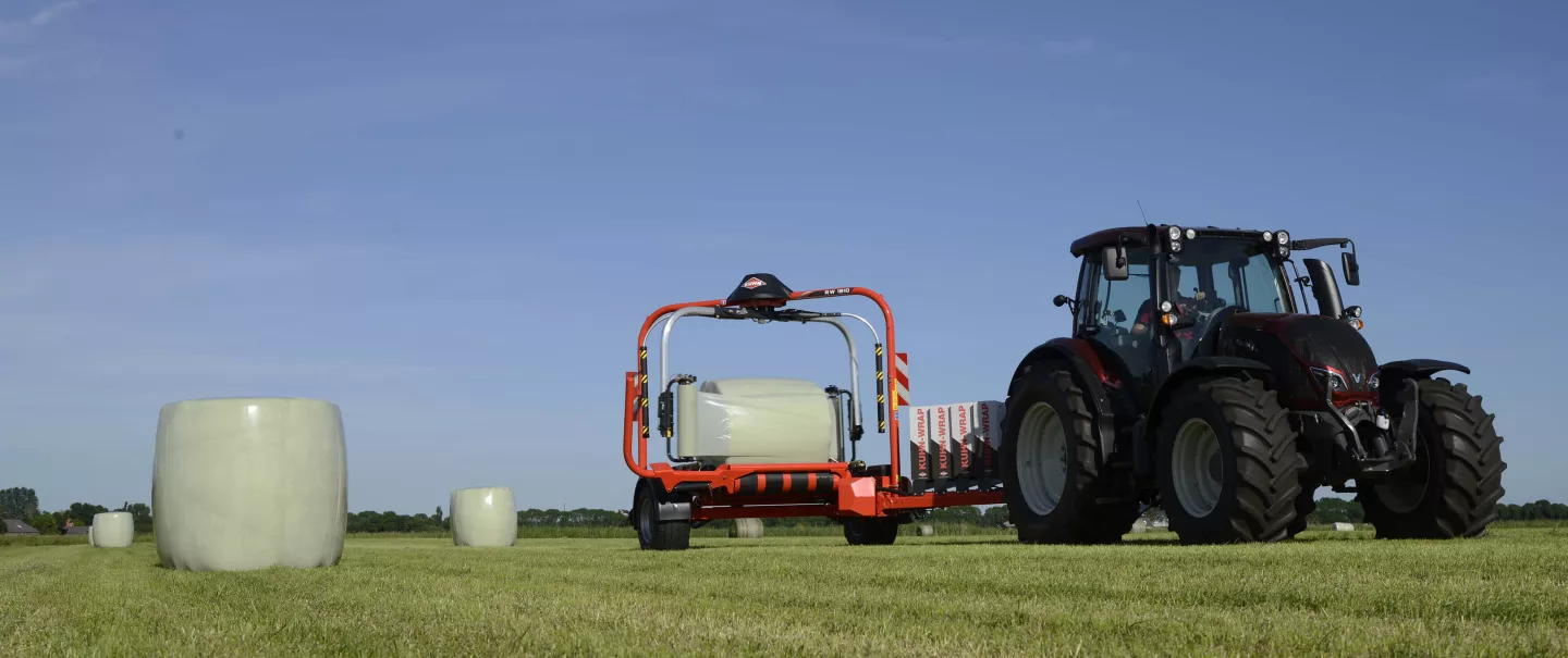KUHN RW 1810 high-capacity inline bale wrapper at work