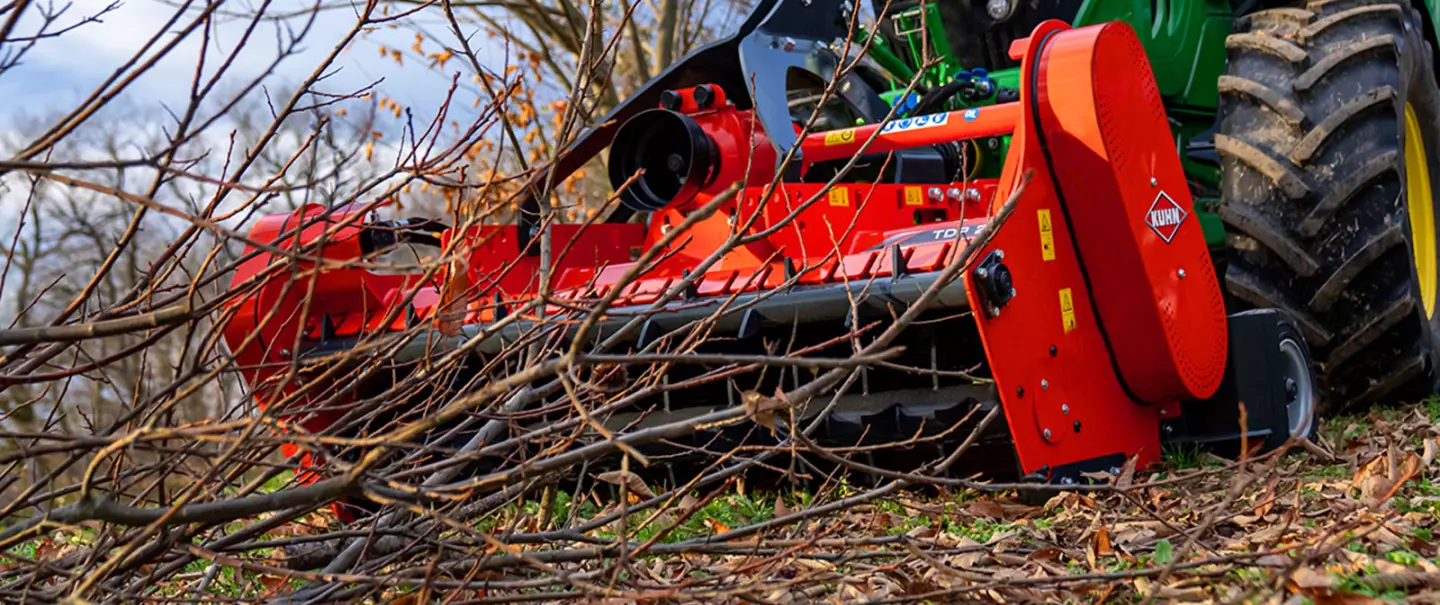 The TDP 2000 shredder coupled in front position at work in a chestnut grove in the south of France