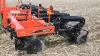 Close-up, side view of mounted 4830 in-line ripper in the field