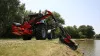 Obstacle clearance of the KUHN AGRI-LONGER GII Hedge and Grass Cutter with pivot-mounted arm safety