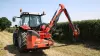 Obstacle clearance of the KUHN AGRI-LONGER GII Hedge and Grass Cutter with pivot-mounted arm safety