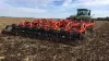 DOMINATOR 4860 deep cultivator in action