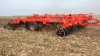 DOMINATOR 4860 deep cultivator in action