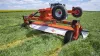 KUHN GMD 5251 TC large-width trailed disc mower on the road