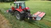 PZ 320 drum mower mowing grass in combination with a front mower