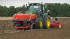 The TF 2300 C front hopper with double compartment at work