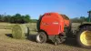 KUHN VB 3200 series round baler baling in the field