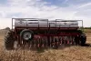 Rear view of ORIZA mechanical seed drill in working position.